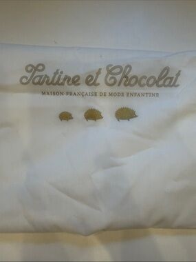 Tartine et Chocolat White Garment Bag with Gold Hedgehog Accents